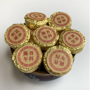 Выдержанный нефритовый Шу пуэр 2003 год 100 г. Photo 2